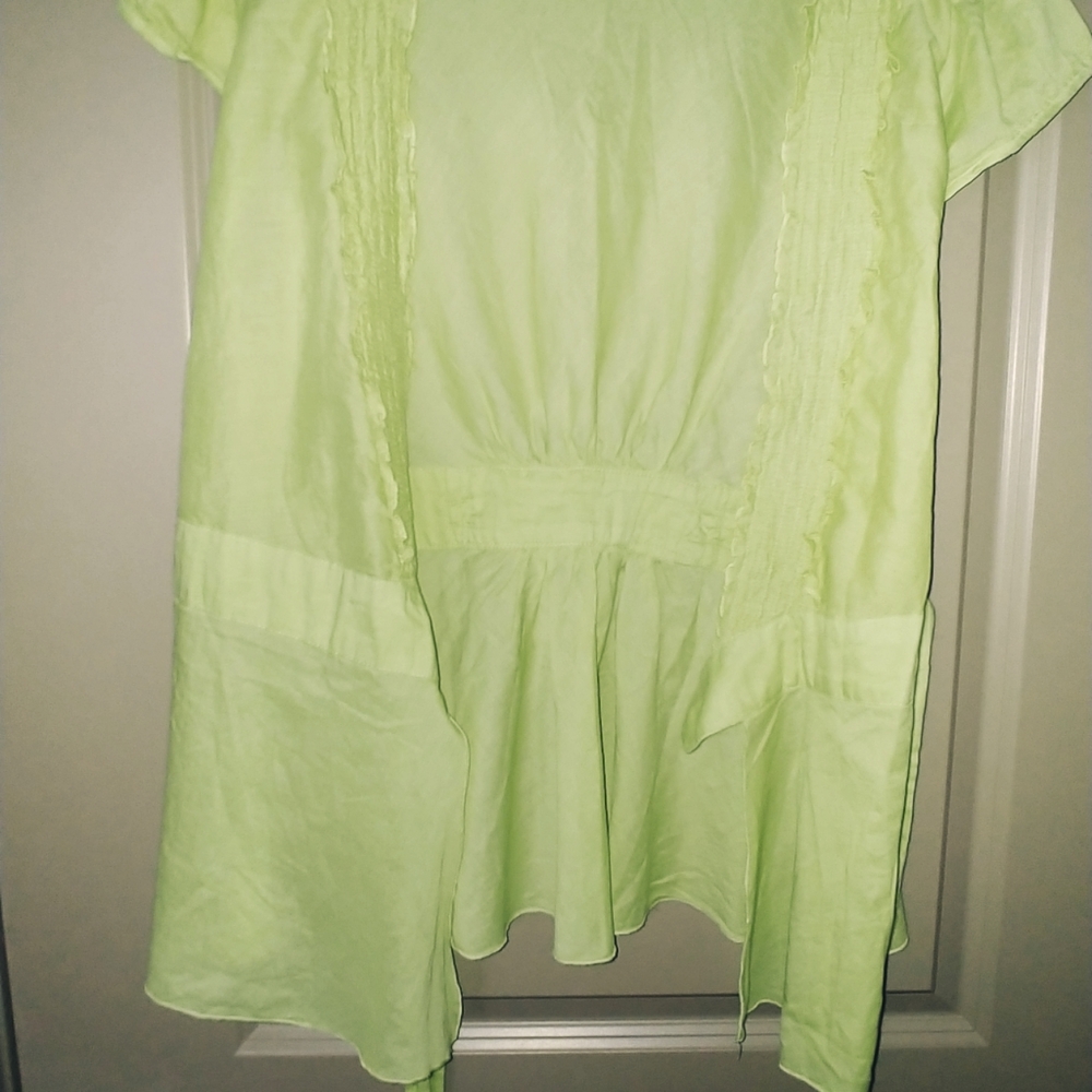Green blouse short sleeve's gather in the back, belt attached.